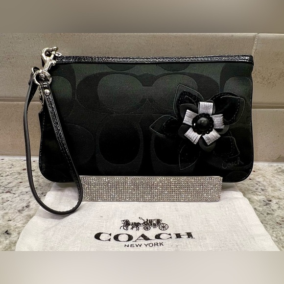 EUC! Coach Black Wristlet with Silver Flower Detail - Picture 1 of 7